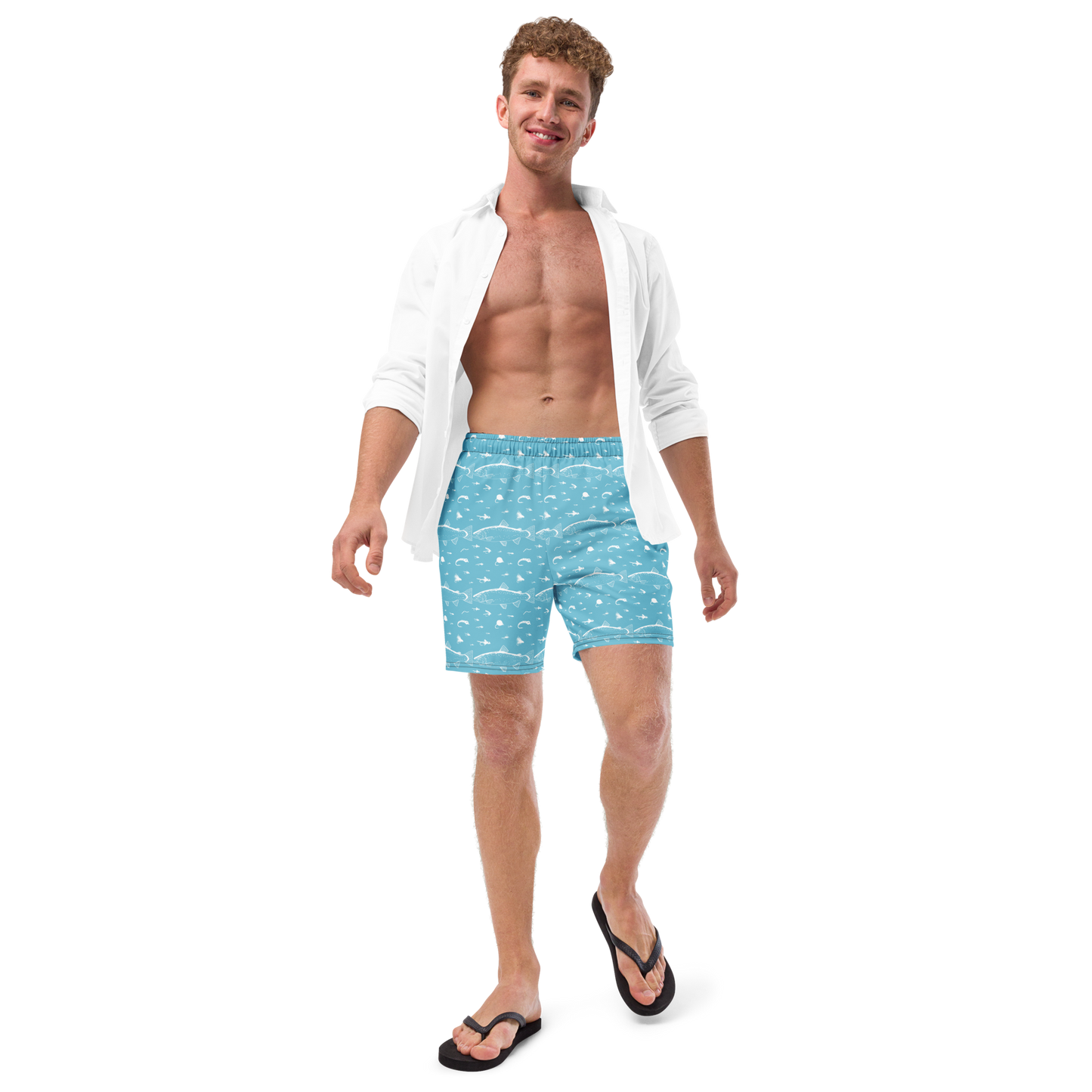 Blue fly fishing shorts / swim trunks. They have a pattern with trout and flies. Model wearing shorts