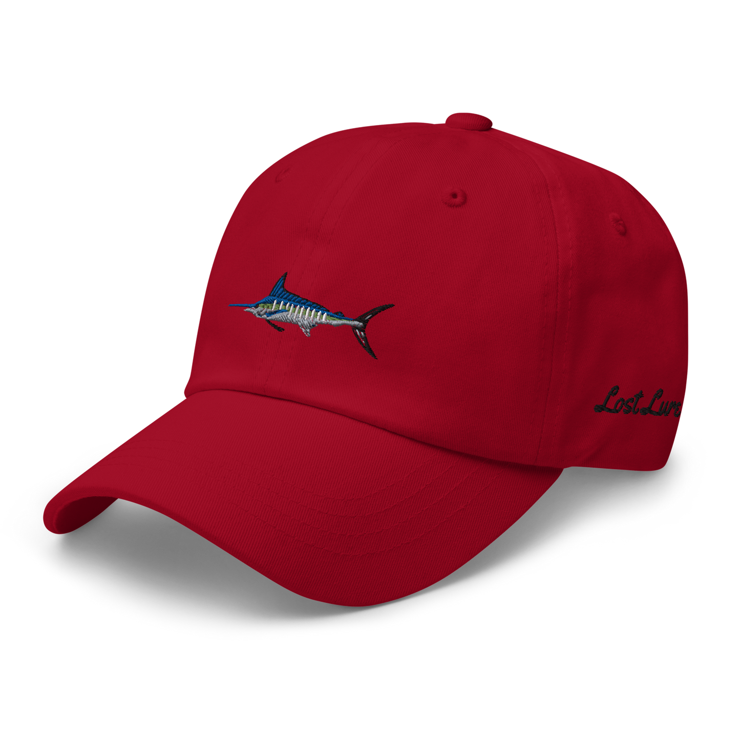 Red colored Marlin fishing fishing hat. Simple fishing hat/ dad hat with embroidered striped Marlin on the front and lost lure embroidered on the left side and back. Front left side view