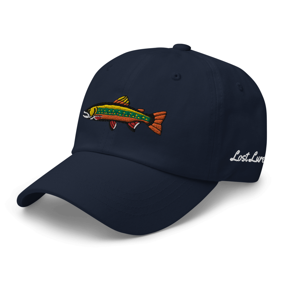 Brook Trout fishing hat. It’s a simple embroidered hat/ dad hat with a brook trout and the lost lure logo on the side. dark blue, front left side