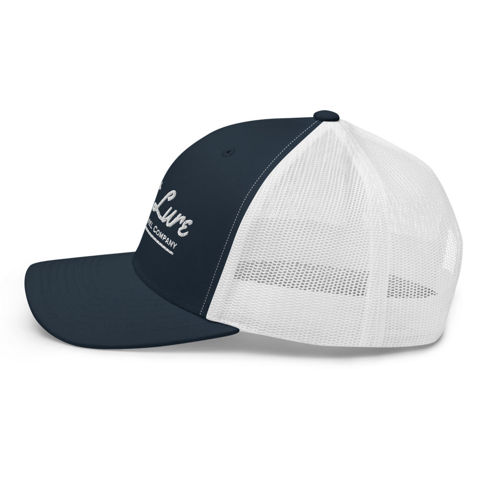 Blue and white Lost lure fishing trucker hat. Left side