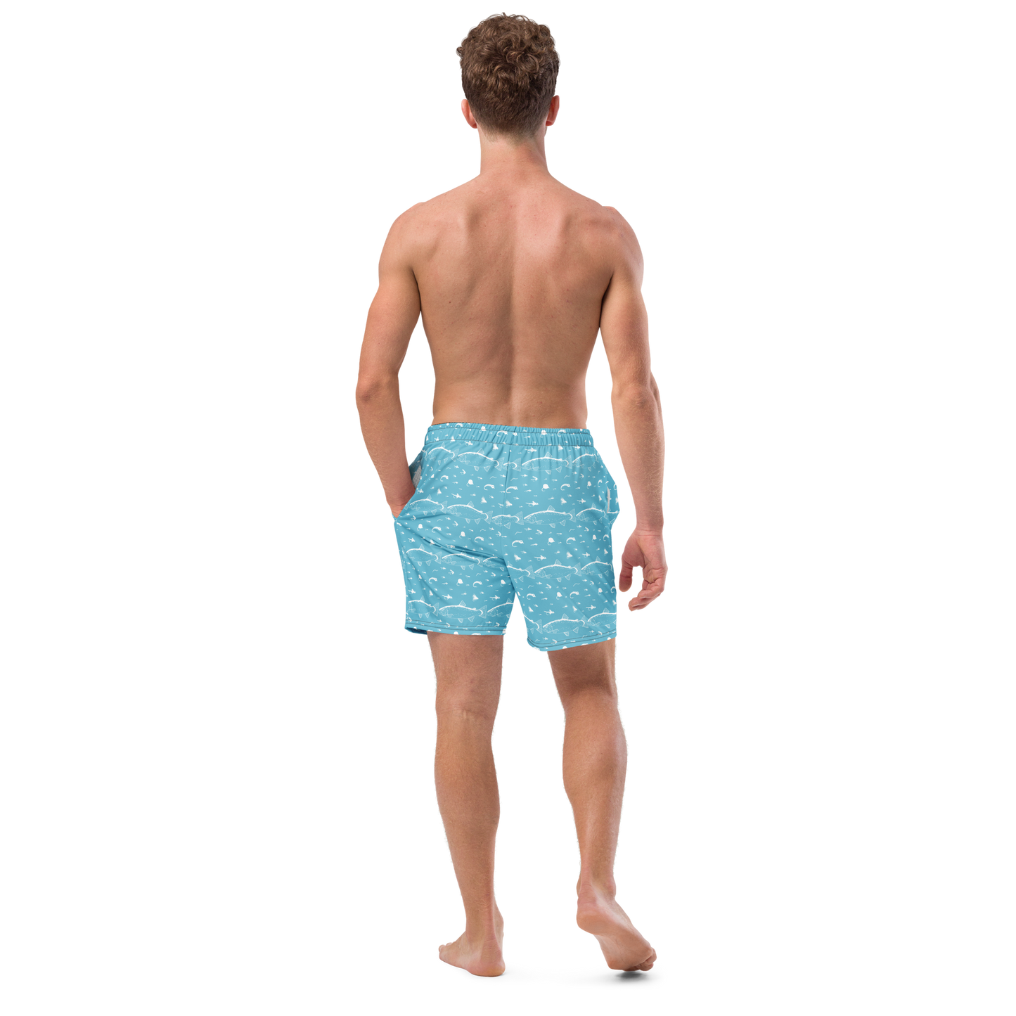 Blue fly fishing shorts / swim trunks. They have a pattern with trout and flies. Back side of model wearing shorts
