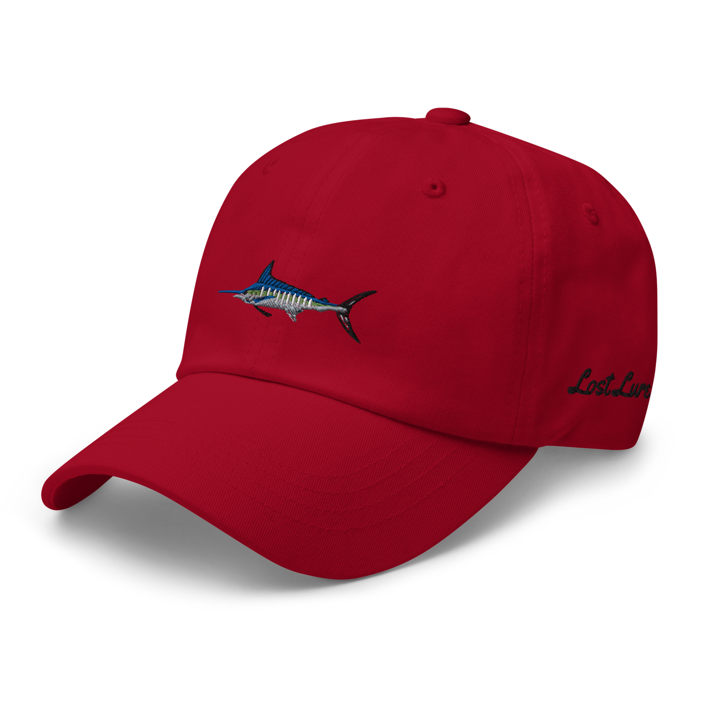 Red colored Marlin fishing fishing hat. Simple fishing hat/ dad hat with embroidered striped Marlin on the front and lost lure embroidered on the left side and back. Front left side view 