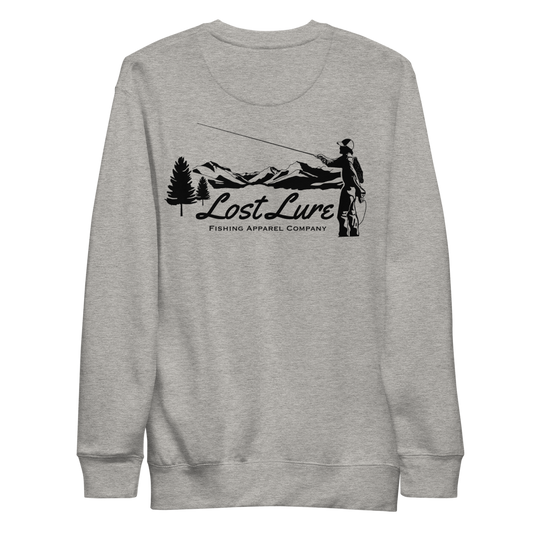 Fly fishing Lost pullover / sweatshirt. It has a design on the back of the sweatshirt of a black and white outline a fly fisherman and the Rocky Mountains. Grey fishing pullover. Back side