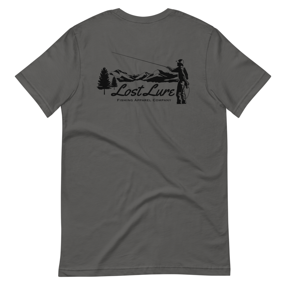 Fly fishing Lost lure shirt. It has a design on the back of the shirt black and white outline a fly fisherman and the Rocky Mountains. Grey fishing shirt, back side