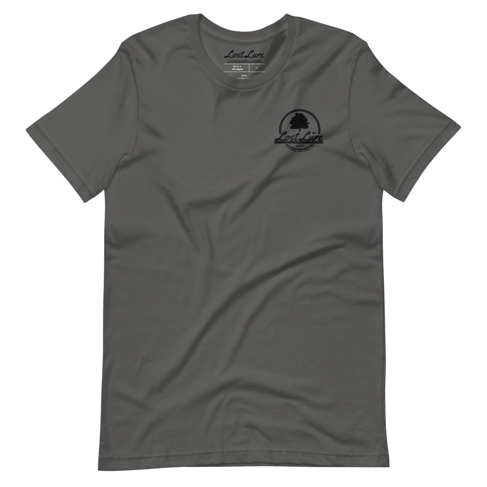 Fly fishing Lost lure shirt. It has a design on the back of the shirt black and white outline a fly fisherman and the Rocky Mountains. Grey fishing shirt, front side