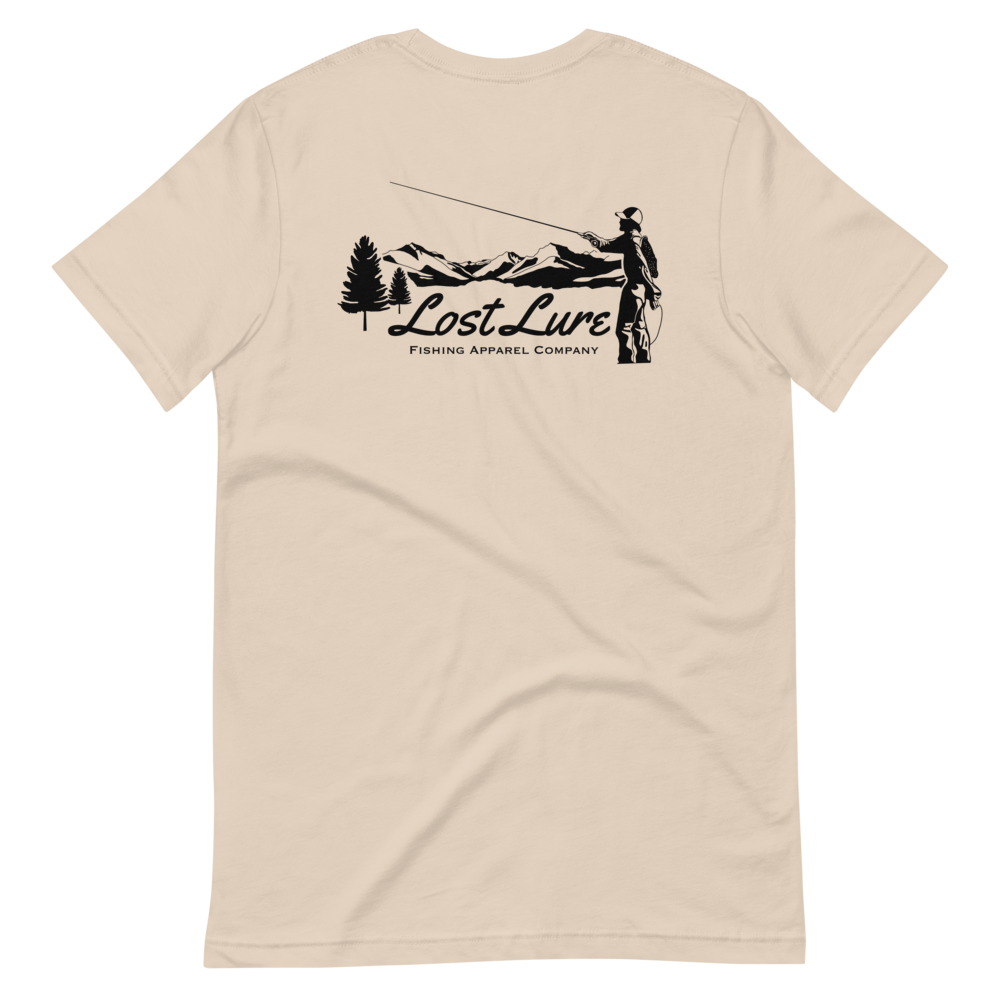 Fly fishing Lost lure shirt. It has a design on the back of the shirt black and white outline a fly fisherman and the Rocky Mountains. Crème  fishing shirt, back side