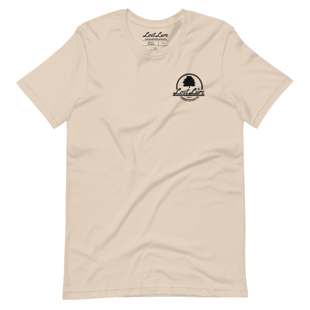 Lost Lure Fishing T-shirt with design that reads “practice catch and release” it has a rainbow trout being released in a river in snowy mountains. Tan fishing shirt, front side